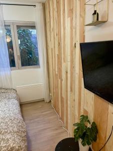 Studio départ tardif sur jardinet