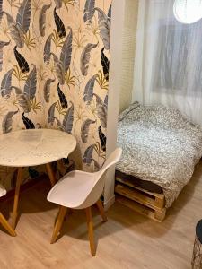 Studio départ tardif sur jardinet