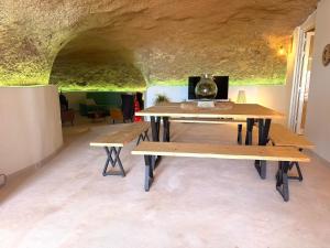 Cave with heated indoor pool and garden