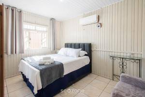 Casa c Churrasq. a 600 m da Praia NUS0636