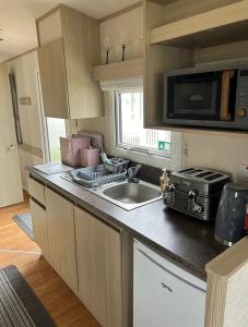 Caravan by the Sea C07