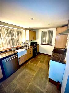 Converted barn stay in idyllic village location