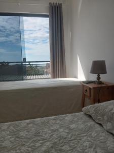 Linda casa com vista pro mar na praia do Santinho