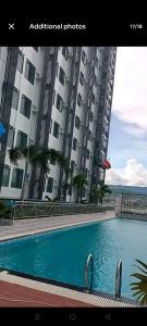 Arc Tower Condominium by Rhen