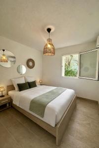 Appartement en rez de jardin-Proche du centre