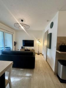 Appartement en rez de jardin-Proche du centre