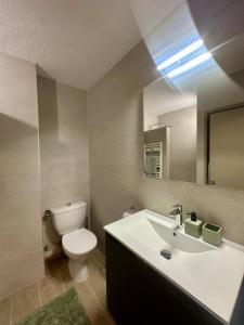 Appartement en rez de jardin-Proche du centre