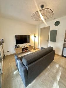 Appartement en rez de jardin-Proche du centre