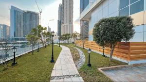 Vogue Vacation Homes, Downtown Mon Reve near Burj Khalifa and Dubai Mall, Two Bedroom plus kids room Apartment with Balcony and Access toAmenities