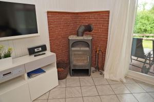 Blockhaus mit grosser überdachter Terrasse