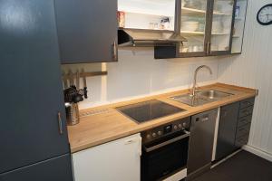 Blockhaus mit grosser überdachter Terrasse