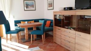 Fewo 7 im Fischerhaus Wintergarten und Terrasse mit Strandkorb