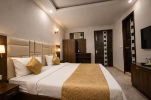Hotel Grand villa by Signature Stayz Near IGI Airport