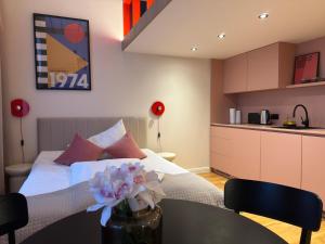 Heritage Haven Mezzanine Apartment with Balcony