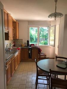 Maison 4 chambres sur terrain clos 1000 m quartier calme