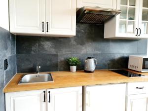 Studio z balkonem przy UG