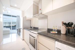 Free housekeeping visits during your stay - StayShort - Studio in Damac Hills that Sleeps 3 with Terrace!