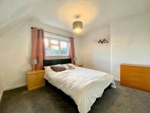 Spacious 3BR Home with Garden and Parking