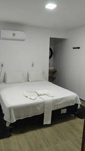 Quarto Duplo com Ar e Banheiro Privativo a poucos metros do mar