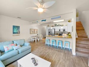 Have a beachy time at this 5 star townhome!