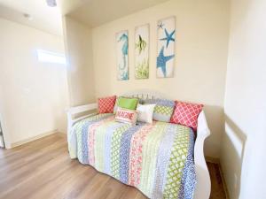 Have a beachy time at this 5 star townhome!