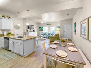 Have a beachy time at this 5 star townhome!