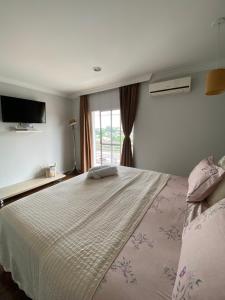 Suíte ampla e confortável 2