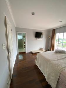 Suíte ampla e confortável 2