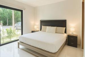 Puerto Aventuras 2BR alberca golf y playa