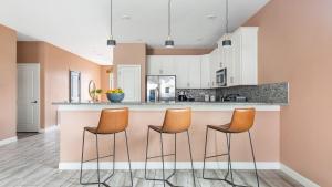 Sleeps 16 8BDR Kid Haven w Pool Arcade Orlando Resort Retreat by AvantStay