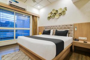 Townhouse Oak PTC Indore Junction