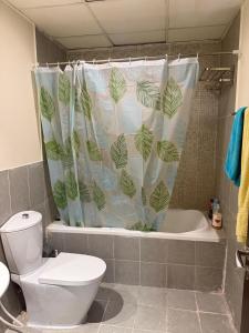 Modern 1BR in JVC, 2 Baths, Pool & Gym, Fully Equipped Kitchen