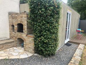 Studio en fond de jardin