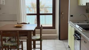 P056 - Porto Recanati, comodo trilocale fronte mare