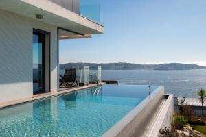 Modern Villa with Sea & River View Pool and Gym.