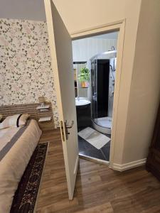 Studio, avec cuisine et salle de bain face au Jardin Massey