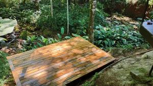 Wooden Cabin with deck Over Creek, walk to beach