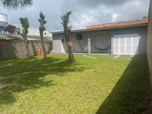 Casa Imbé - Acomoda 12 Pessoas