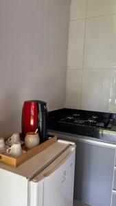 Bangalô em uma área próxima a praia e centro