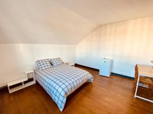 Chambre privative dans maison partagée avec dautres voyageurs