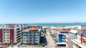 Apê 100m Praia Grande, terraço com churrasqueiras e linda vista mar by Majestosa Tamporada