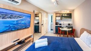 Estúdio com vista mar e piscina no rooftop