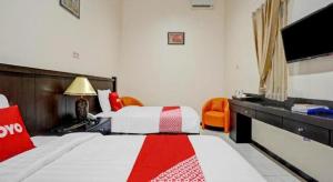 Collection O 90693 ORCHID EDOTEL Boyolangu