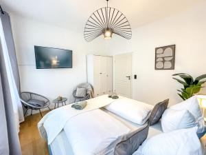Ferienwohnung mit kostenfreier Tiefgarage im Zentrum mit 2 Schlafzimmern & Kingsize Betten
