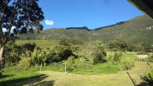 Casa, Montanha e Rio