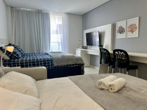 Studio aconchegante c vista piscina