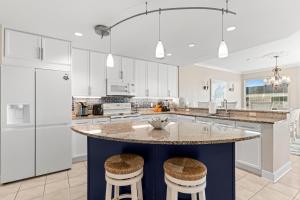 Bright 4BR condo with huge balcony, pools, and direct beach access