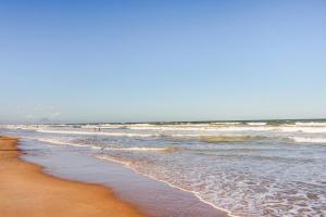 Coruja da Praia Verão Vermelho Unamar Cabo Frio