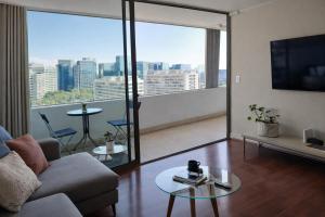 Departamento con vista mas piscina y estacionamiento al lado Parque Arauco