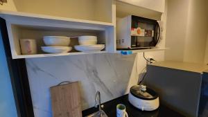 30bkk A2533 Monthly Condo Skytrain Minutes away Full Kitchen and Bath!